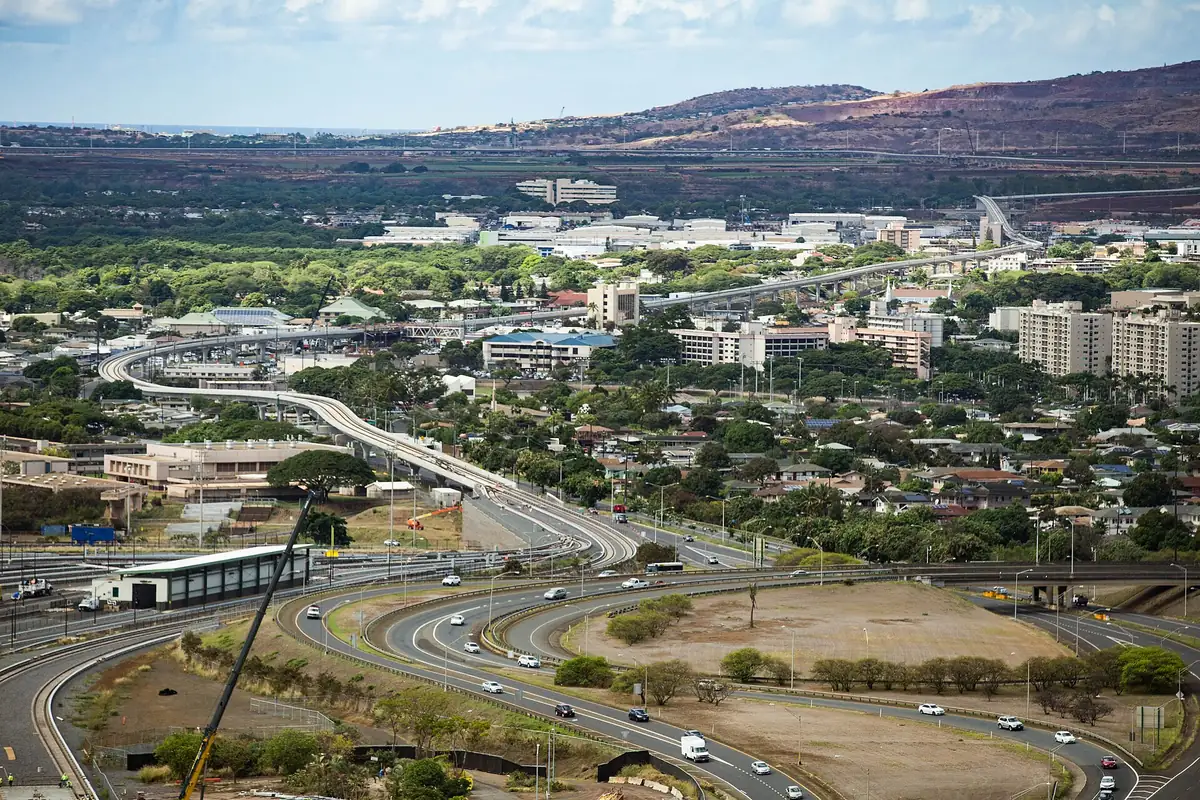 View southwest from Pearl City, O'ahu, over the H-1 freeway and the Skyline rail line